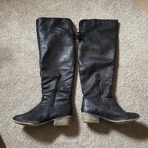 Black knee-high riding boots